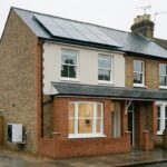 UK terraced house with solar panels, double glazing and an air-source heat pump — features that score well on the new EPC metrics introduced in 2026